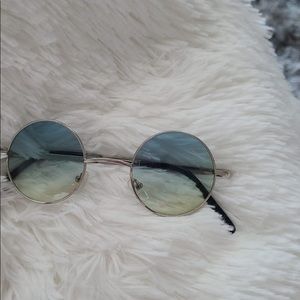 Sunglasses new with litters scratches no return no